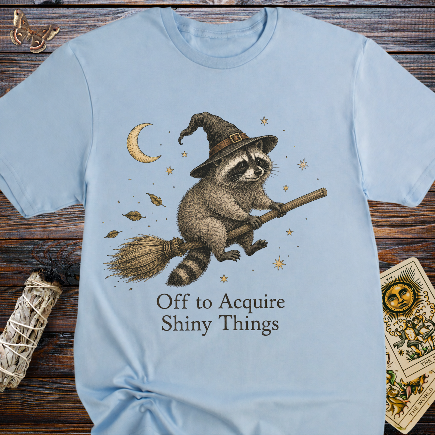 Off to Acquire Shiny Things Raccoon Witch Shirt | Funny Graphic Tee